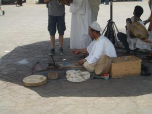 Snake charmer in the main square