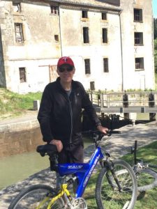 Mark happy to get on a bike.