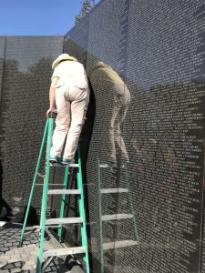 The Vietnam memorial; guides do rubbings of names